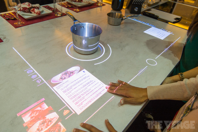 Interactive touchscreen induction hob